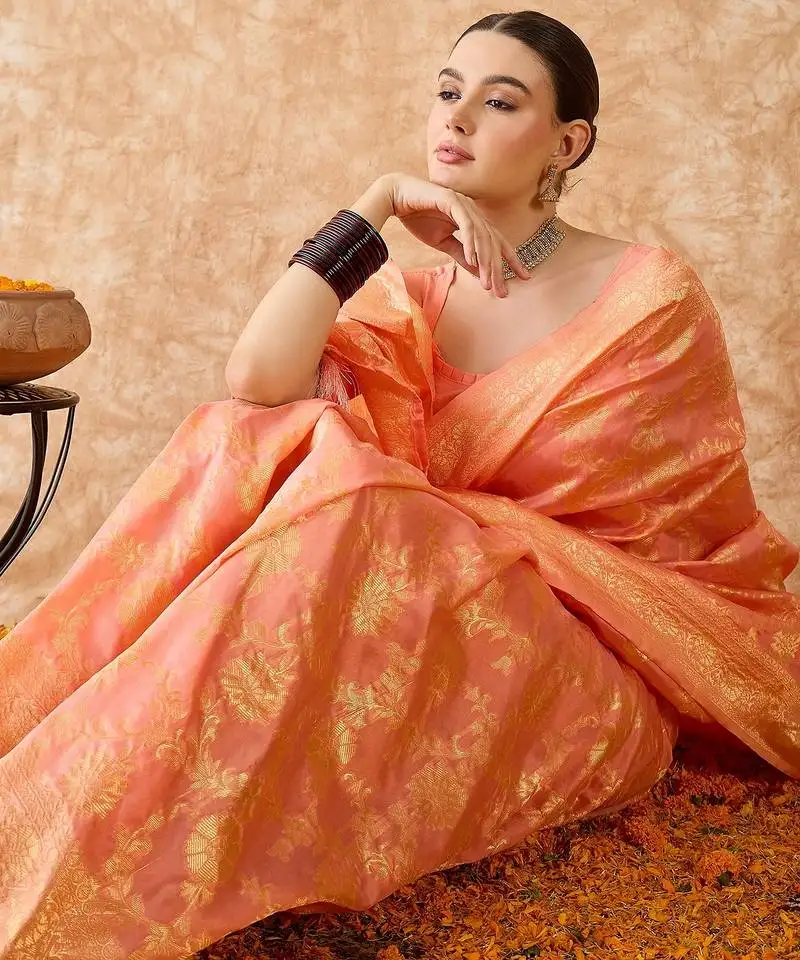 Peach banarasi art silk saree with elegant weaving work
