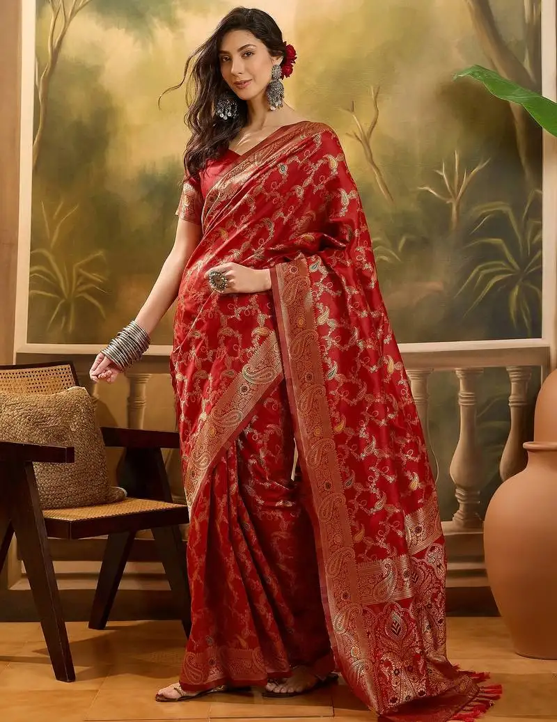 Red banarasi jacquard saree with intricate zari weaving, mina & lace work on pallu