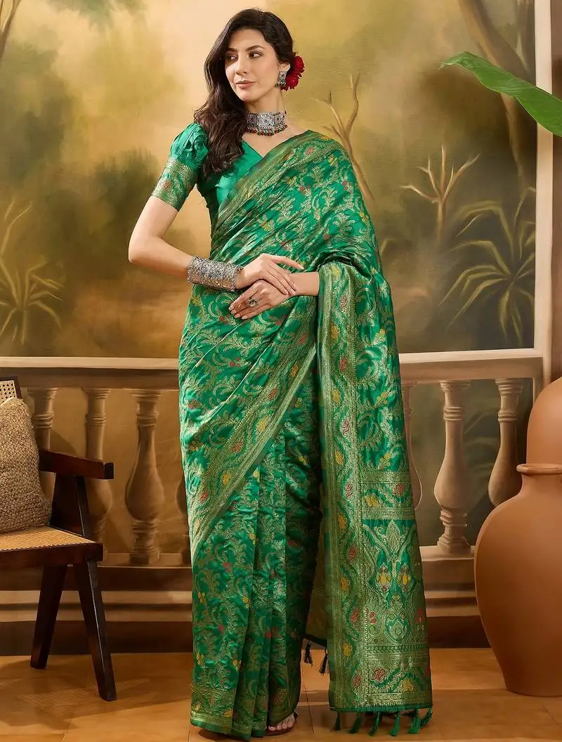Green banarasi jacquard saree with elegant zari weaving & tassel pallu includes unstitched blouse