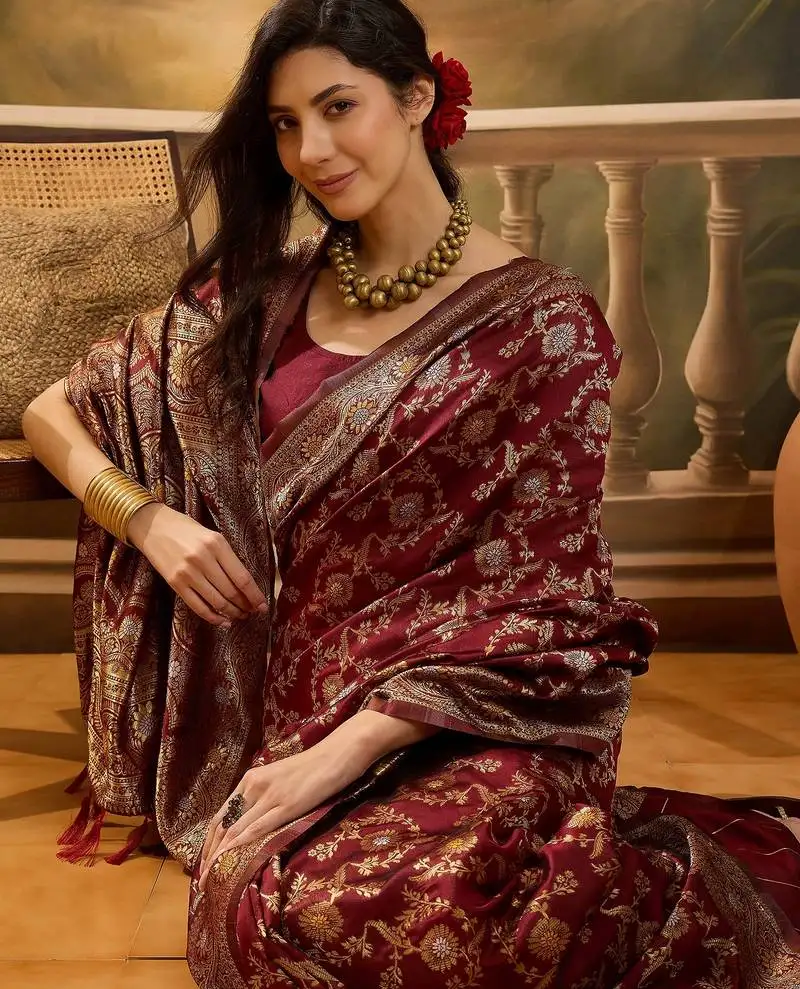 Regal maroon banarasi jacquard saree with zari weaving & tassel pallu unstitched blouse