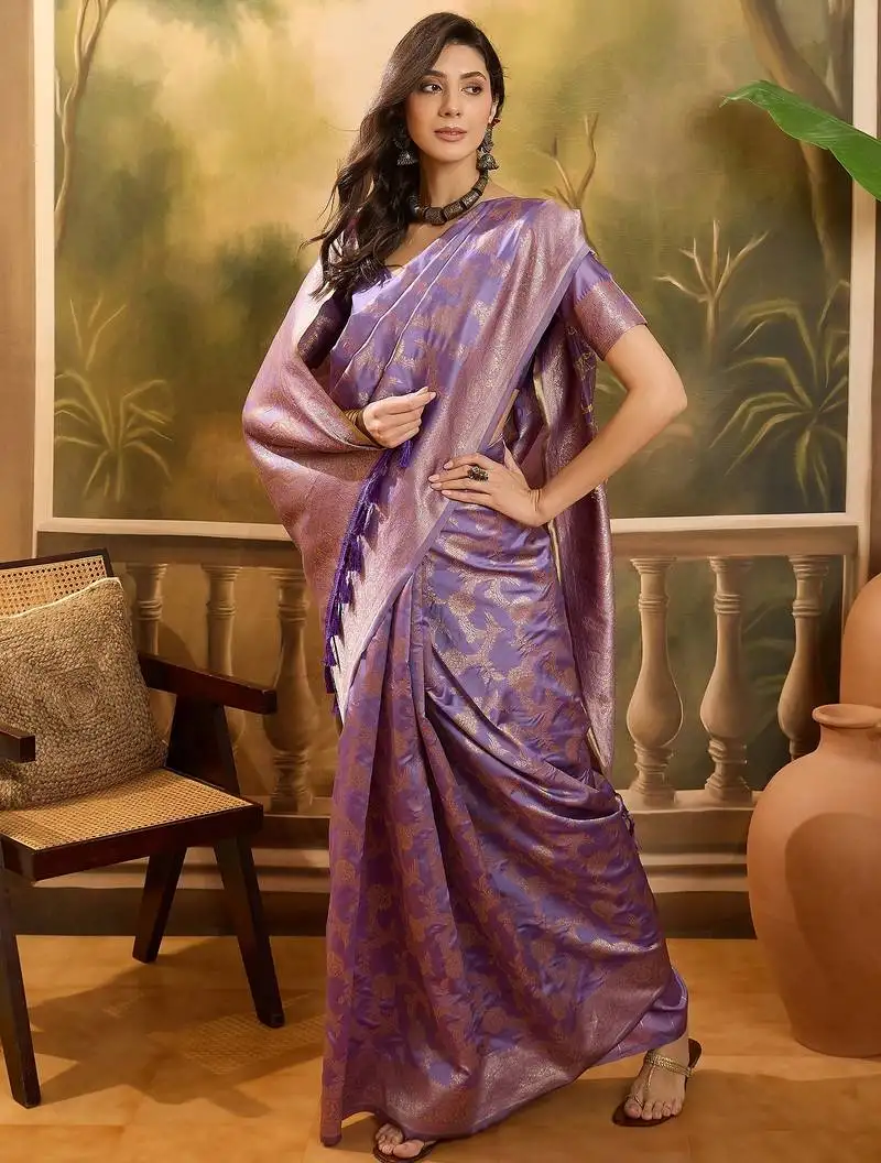 Lavender banarasi jacquard saree with golden zari weaving & tassel pallu unstitched blouse
