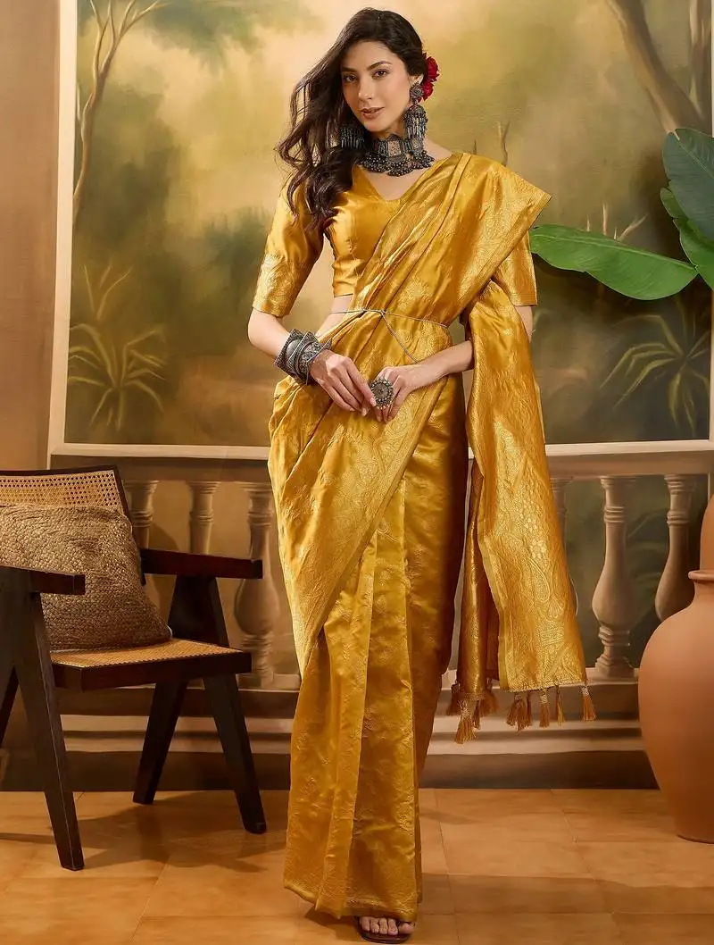 Golden banarasi jacquard saree with rich zari weaving & tassel pallu unstitched blouse
