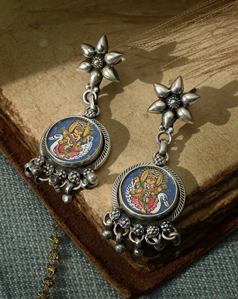 Handcrafted goddess motif earrings