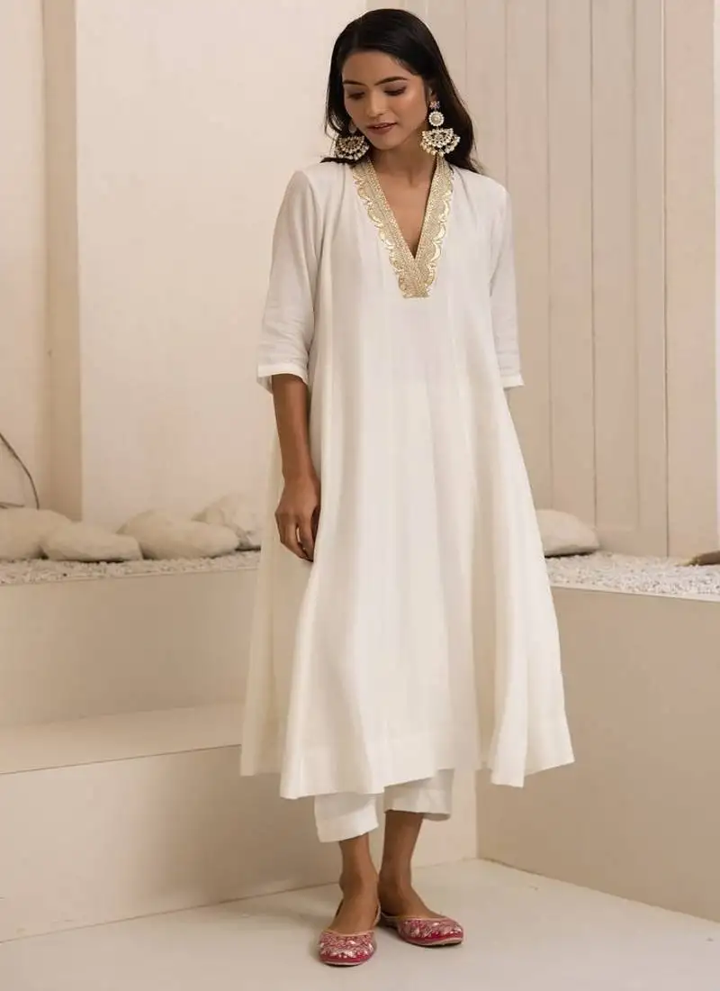 Ivory plain dola silk anarkali set with neckline embroidery