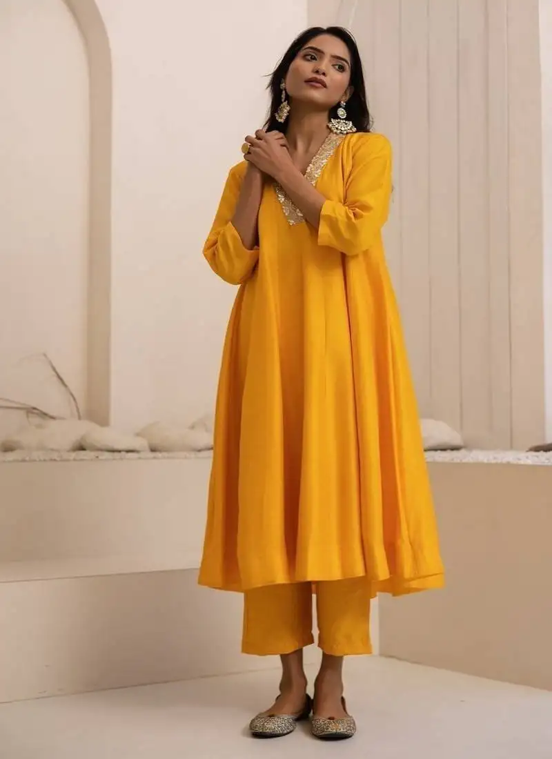 Yellow plain dola silk anarkali set with neckline embroidery