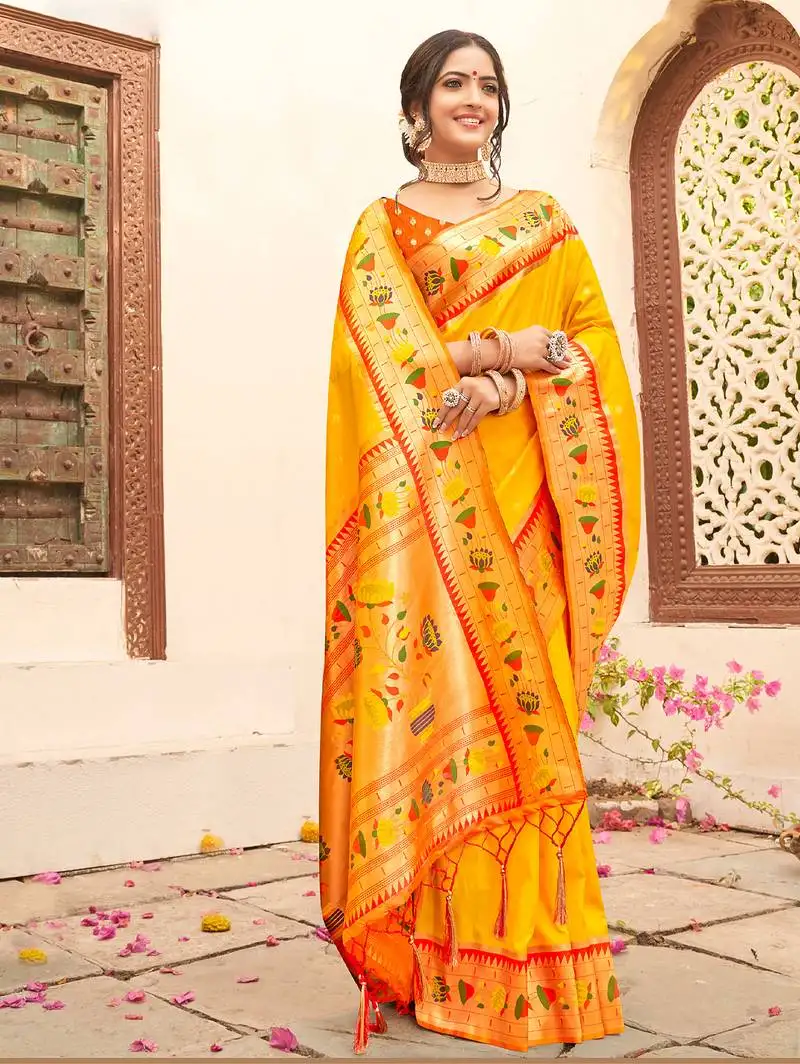 Yellow color silk blended heavy woven designer ethnic partywear saree