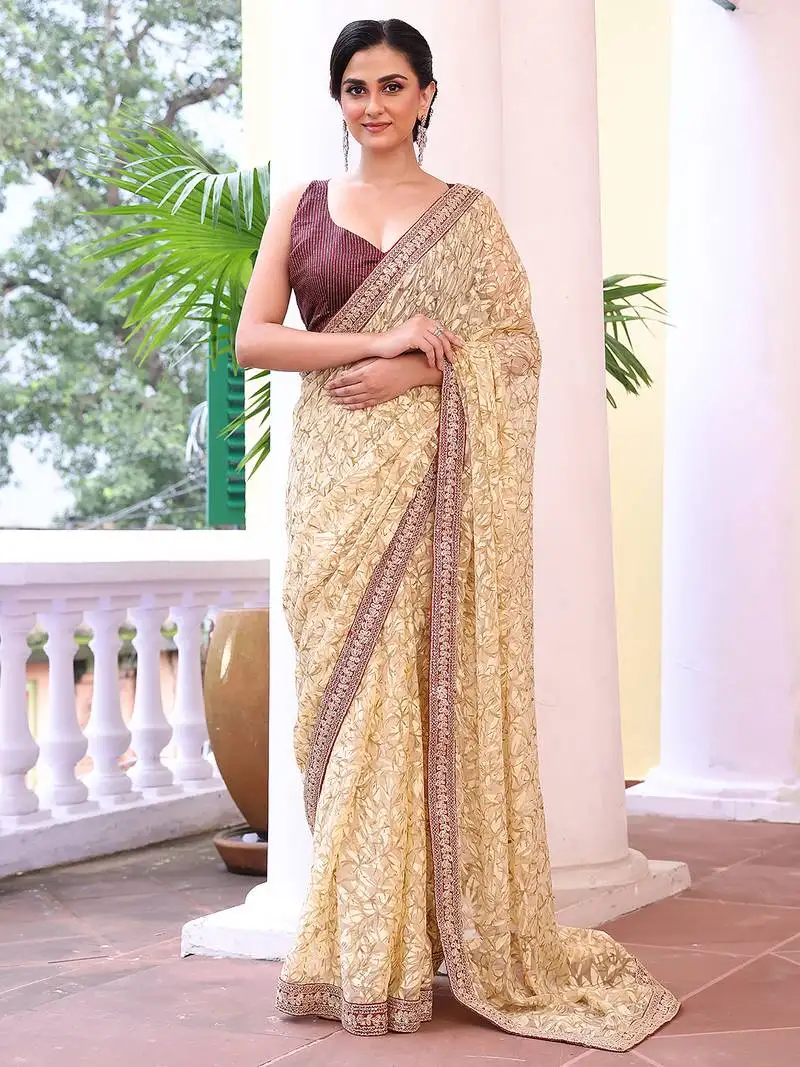 Beige color brasso fabric heavy ceremonial wear bollywood saree