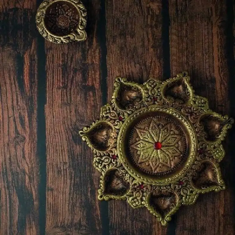The handicraftian 7 diya plate
