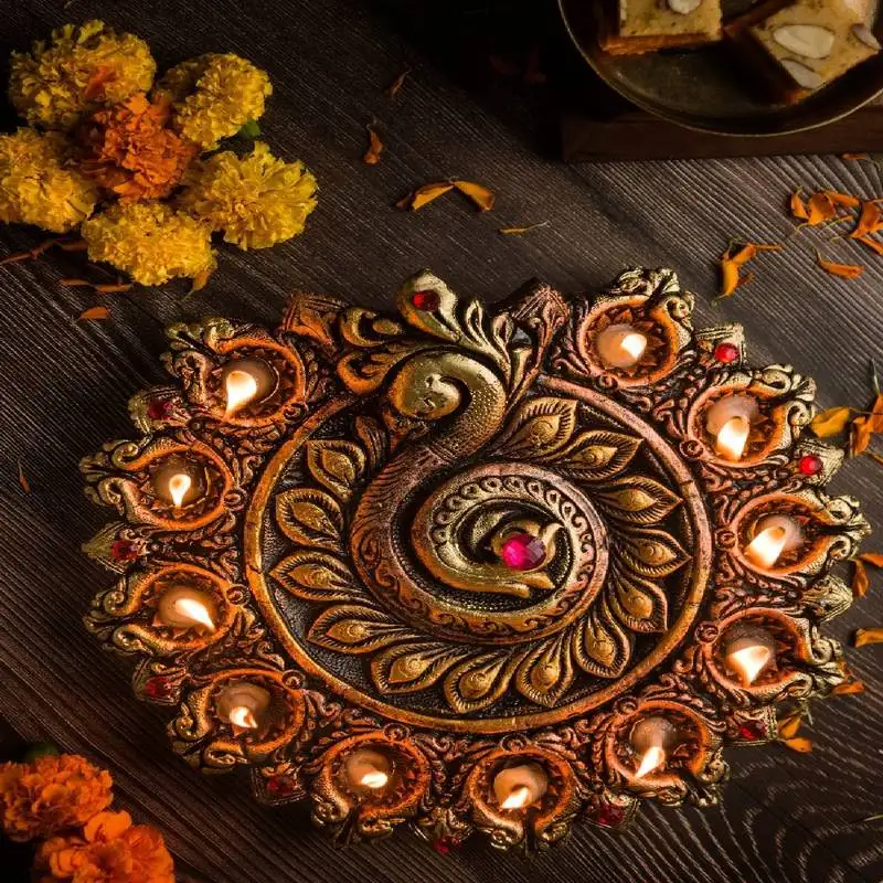 The handicraftian peacock 11 diya plate