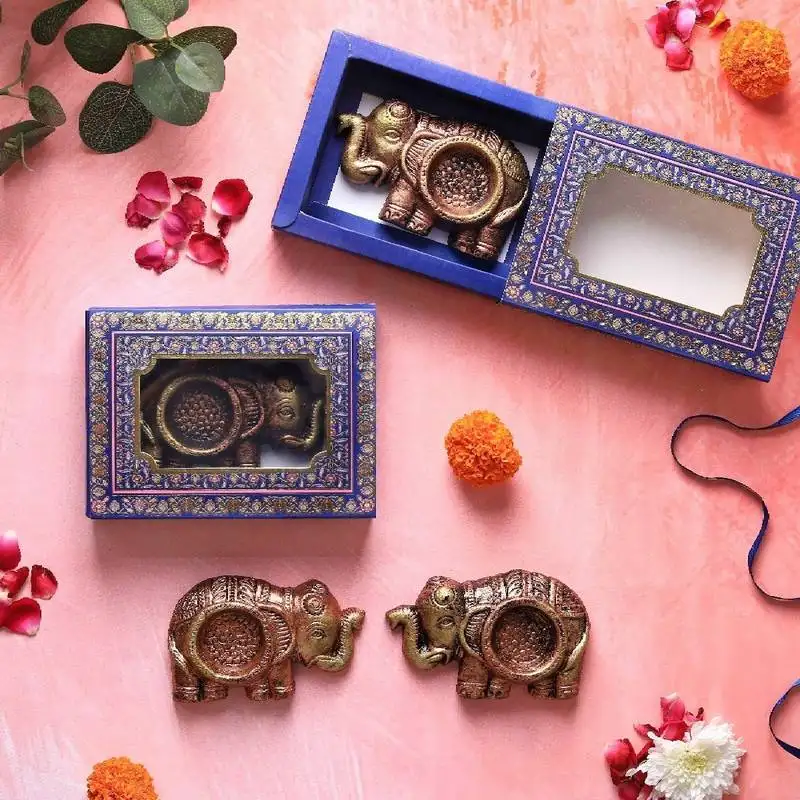 The handicraftian elephant t light set of 4