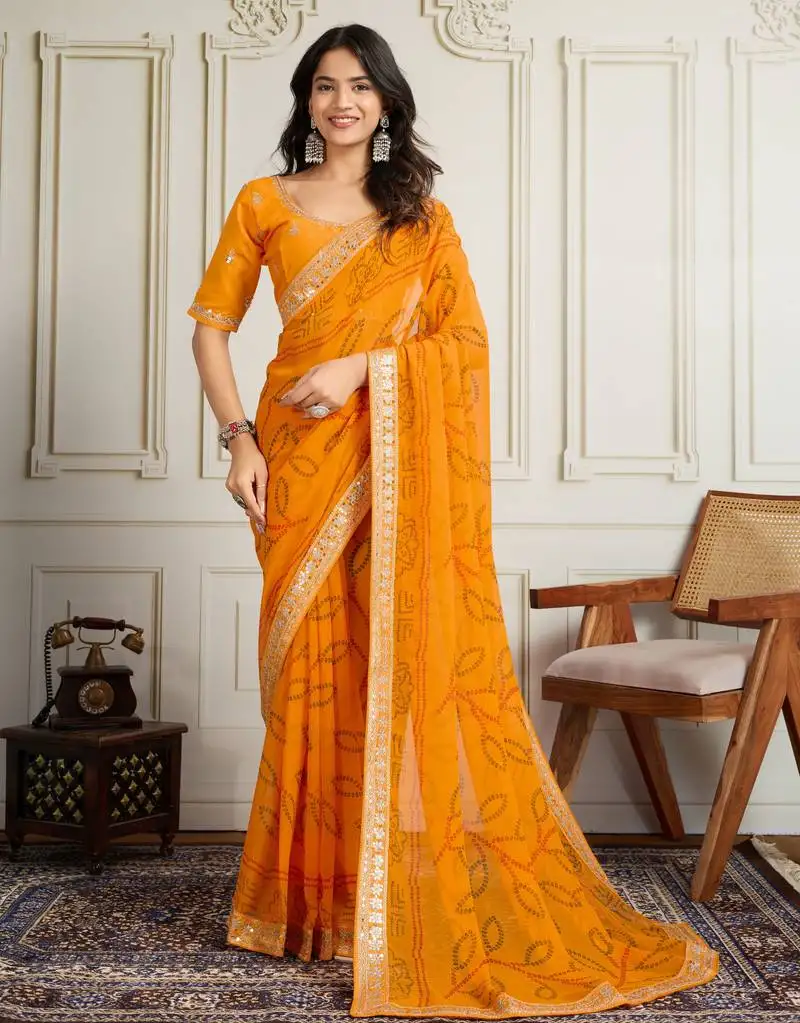 Yellow color festive special georgette fabric bandhej saree for festive looks