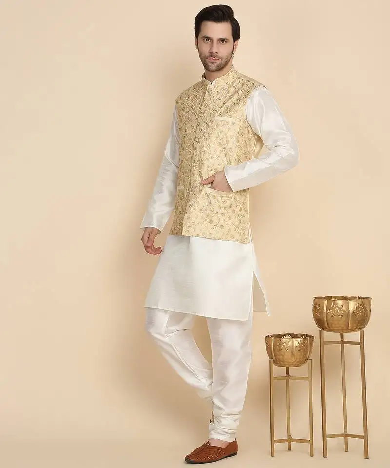 Silk blend solid cream kurta and churidar with zari embroidered beige nehru jacket