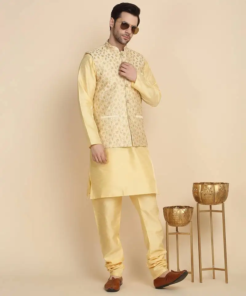 Silk blend solid beige kurta and churidar with zari embroidered beige nehru jacket
