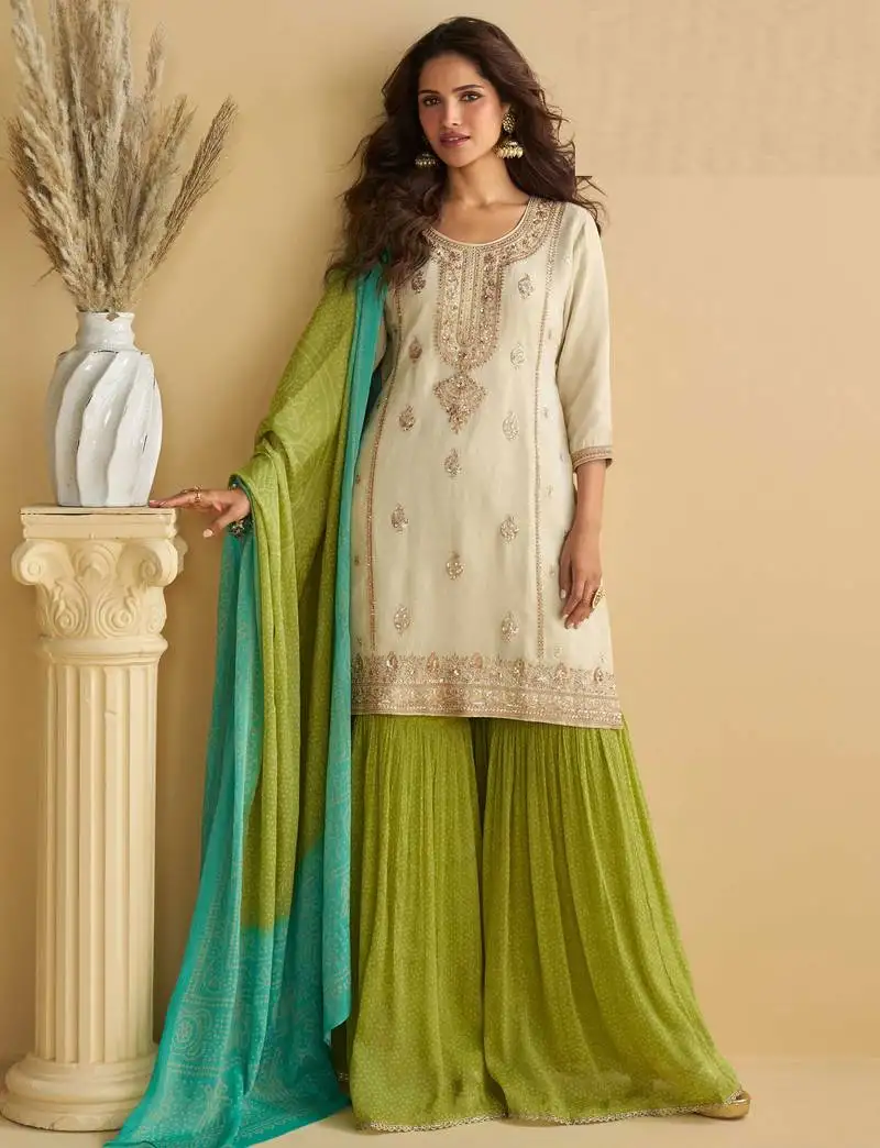 Off white zari embroidery , sequins , beads & printed chinnon straight sharara suit- free size stitched(size upto 42")