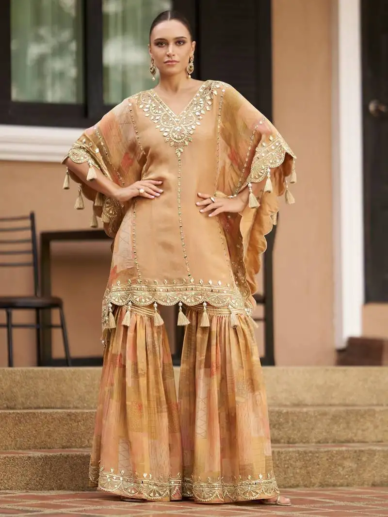 Light brown chinnon silk kaftan gharara suit with embroidery, sequins, mirror, gota & tassel work, free size up to 42" stitched
