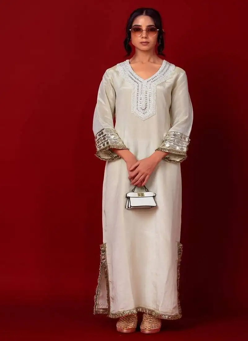 Ivory embroidered tissue dress