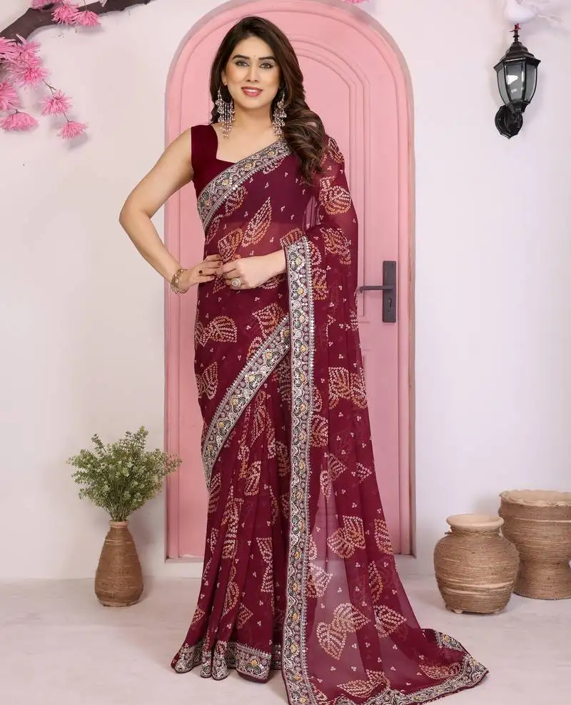 Wine color beautiful printed georgette saree with embroidered lace border