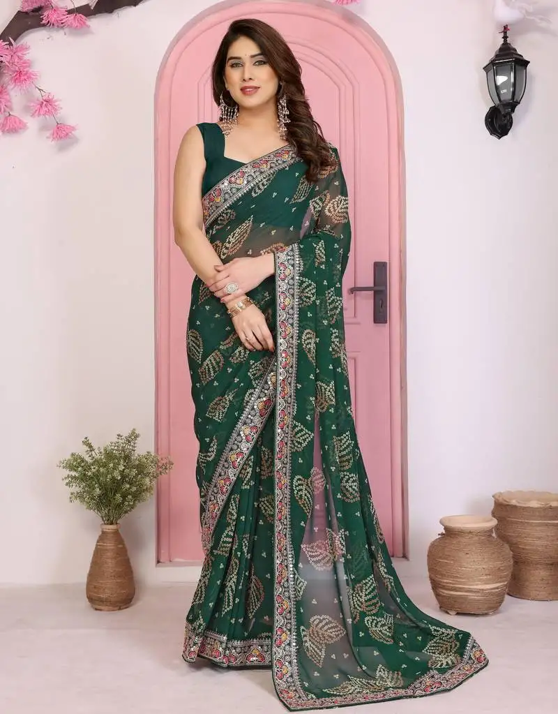 Teal color beautiful printed georgette saree with embroidered lace border
