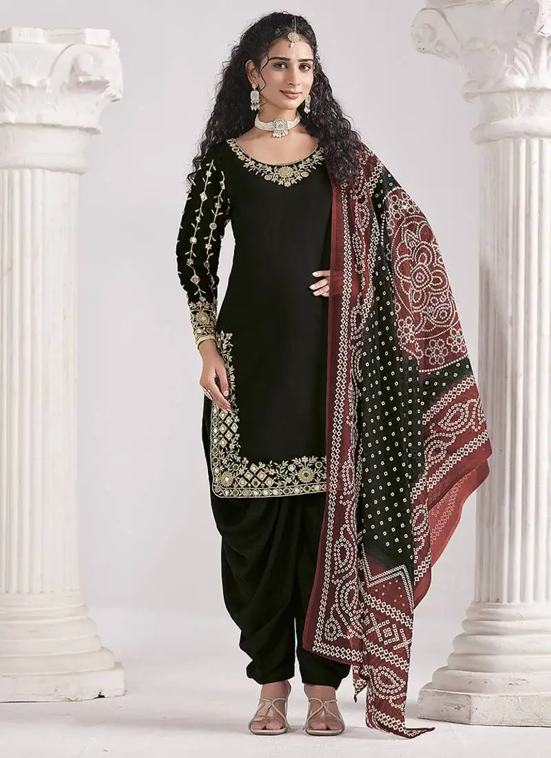 Black embroidered & mirror roman silk patiala suits semi stitched