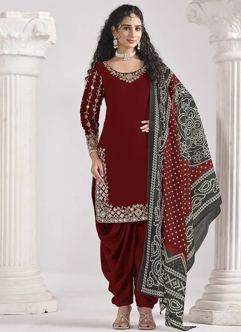 Maroon embroidered & mirror roman silk patiala suits semi stitched