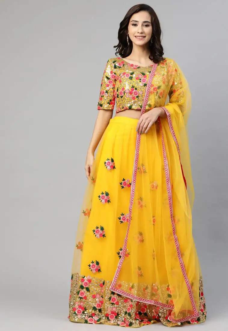 Women's yellow embroidered sequinned semi stitched lehenga & unstitched blouse with dupatta
