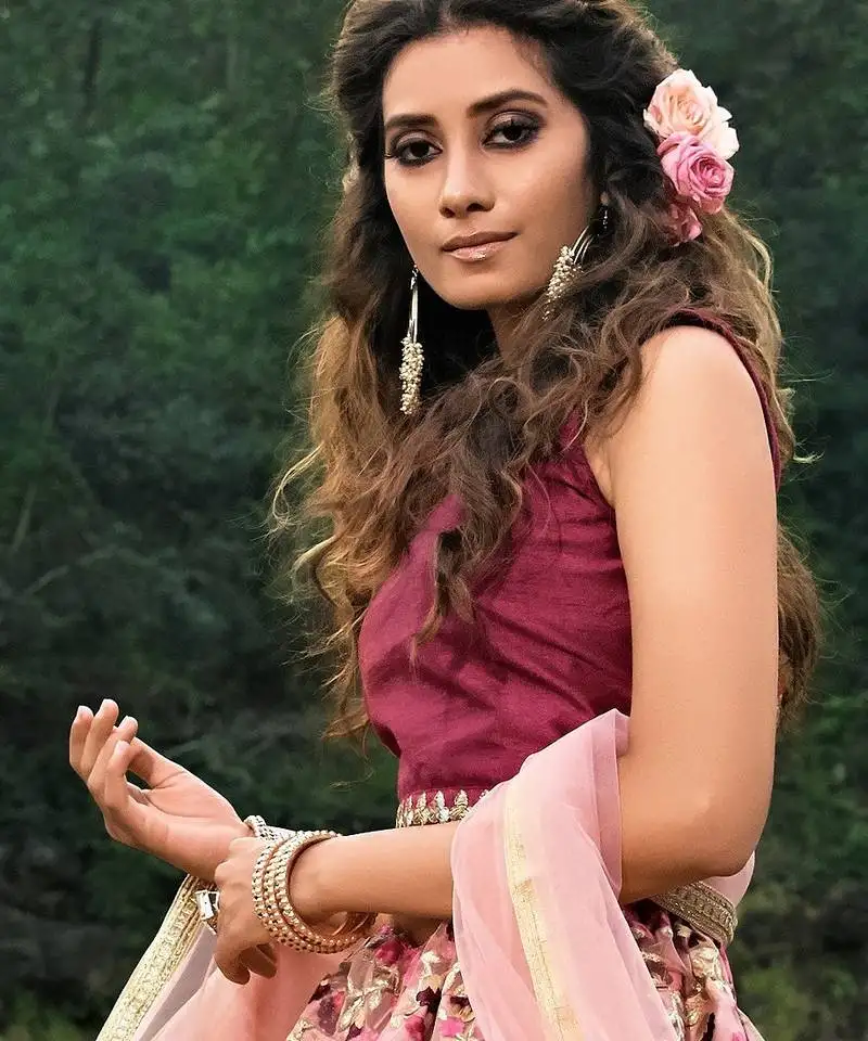 Glamorous multi-colored soft net base flared lehenga choli