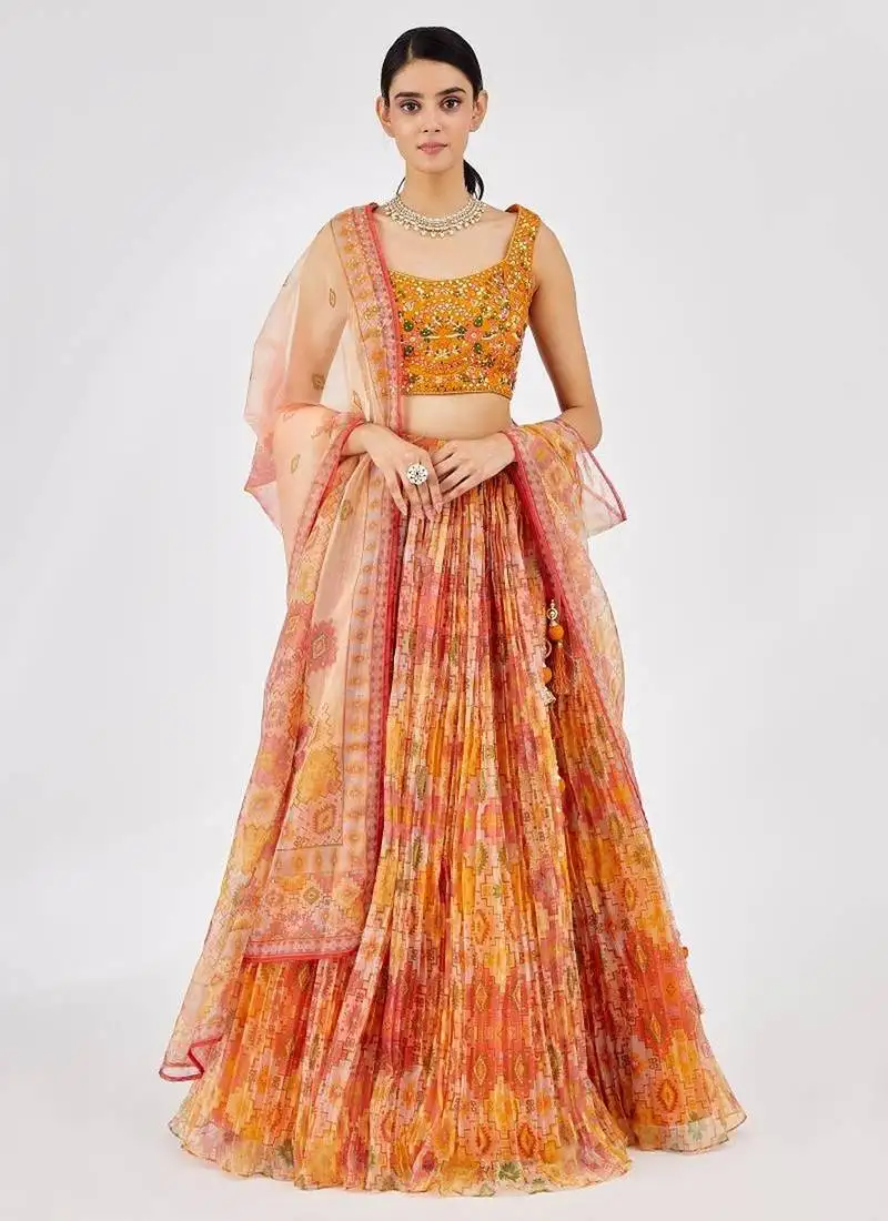 Bright yellow mirror work organza function wear lehenga choli