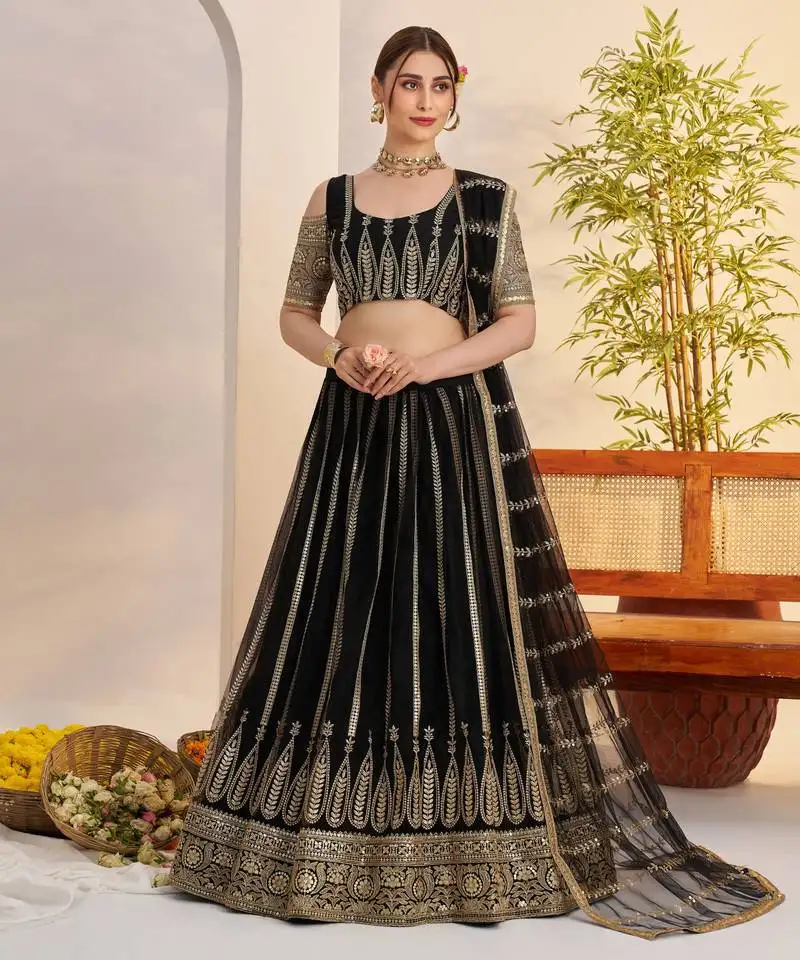 Black net with embroidered party wear lehenga choli
