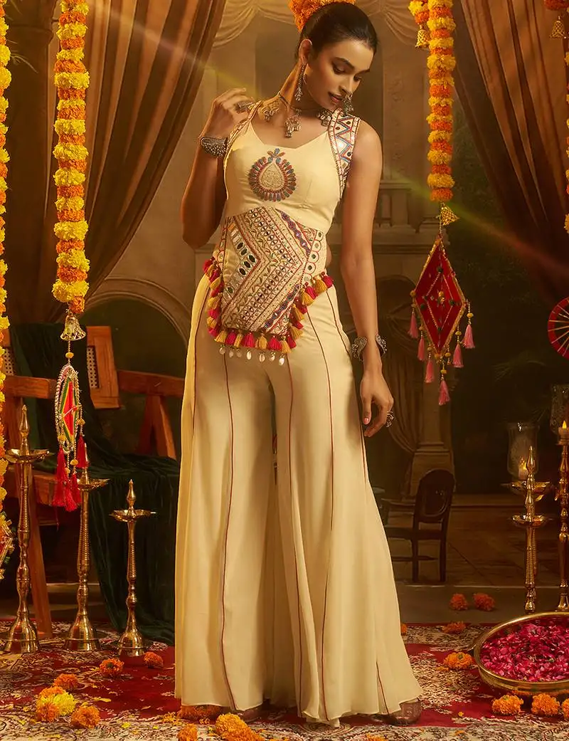 Cream georgette embroidered top with mirror, thread, tassels, shells and palazzo set