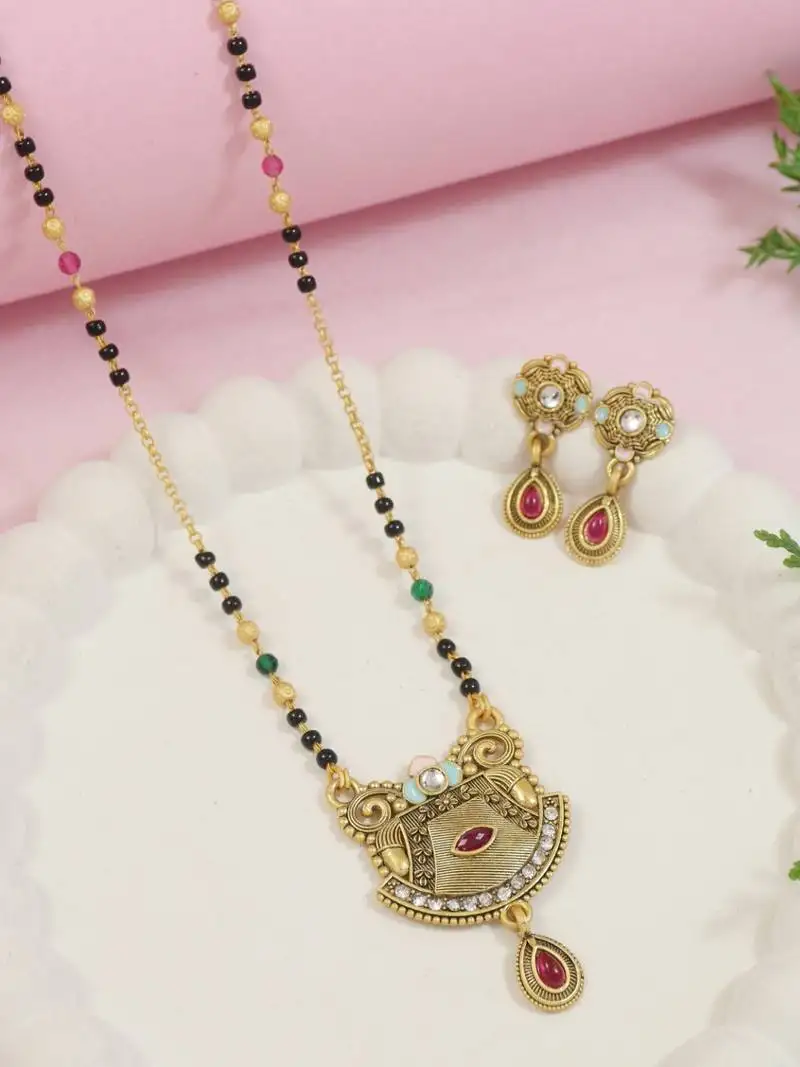 Gold plated traditional studded pendant & black bead chain mangalsutra with earrings for women