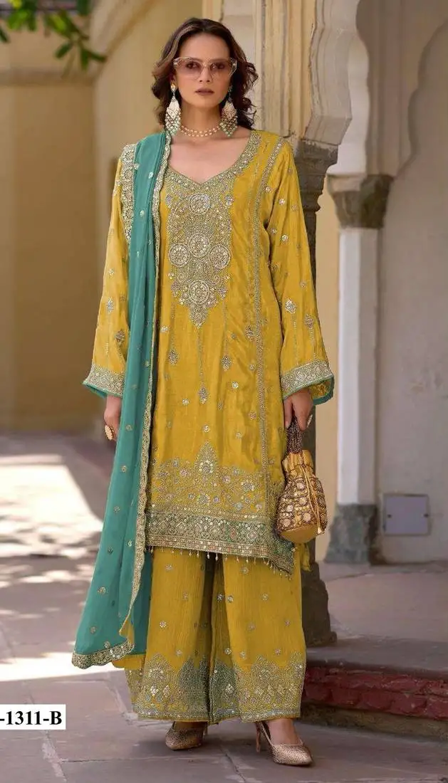 Yellow heavy chinon semi stitched suit with embroidery bits work