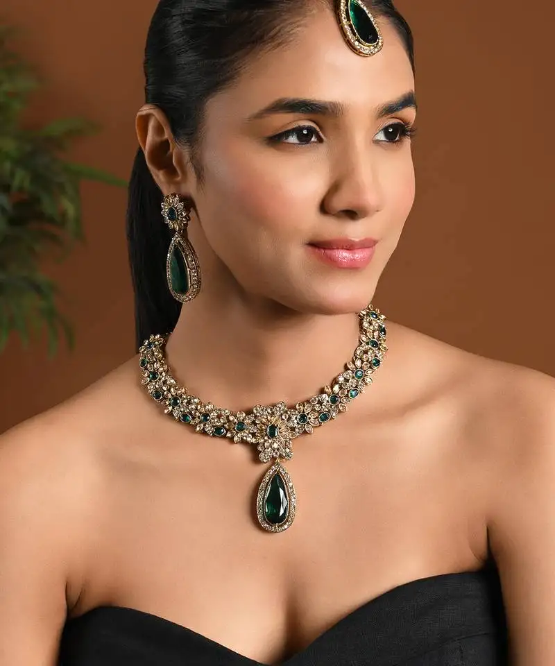 Gold plated stylish design crystal diamond traditional floral necklace with earrings & maang tikka jewellery