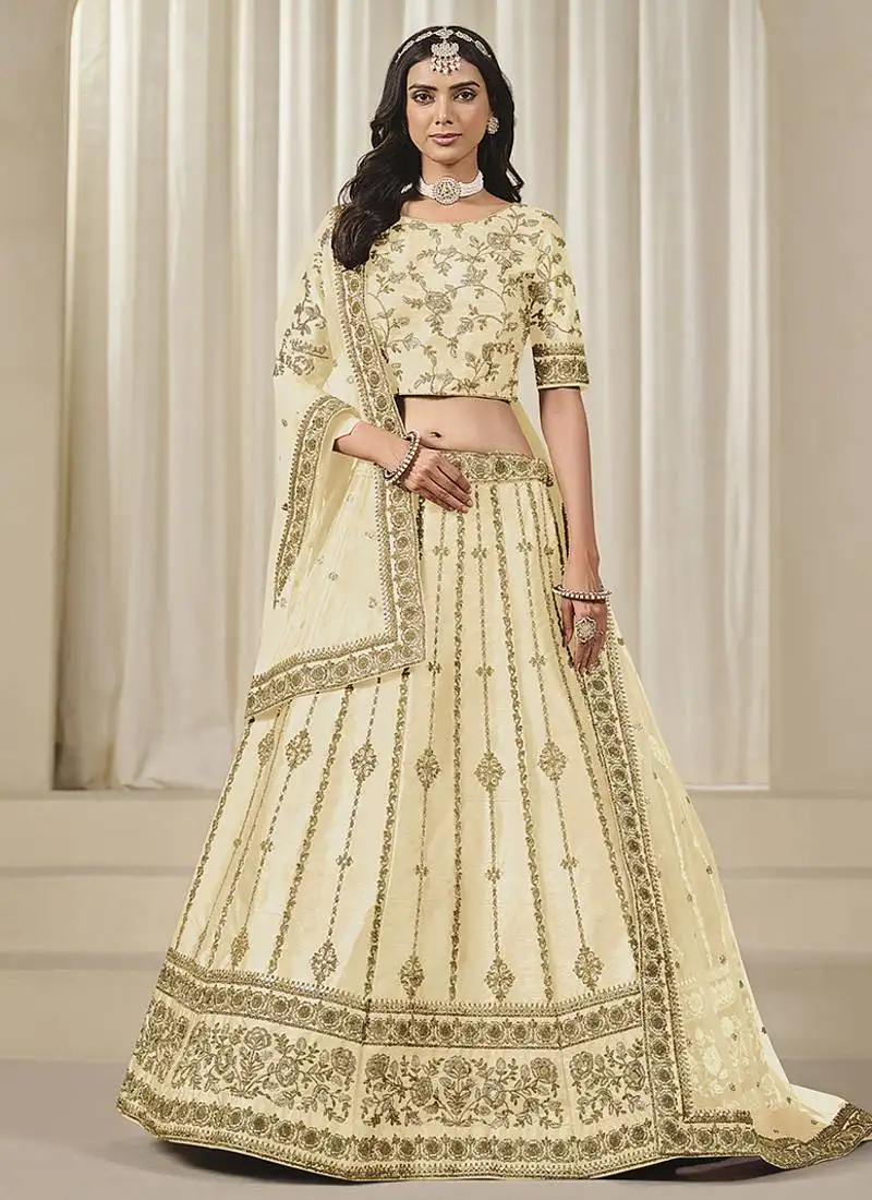 Cream embroidered sequins work art silk lehenga choli