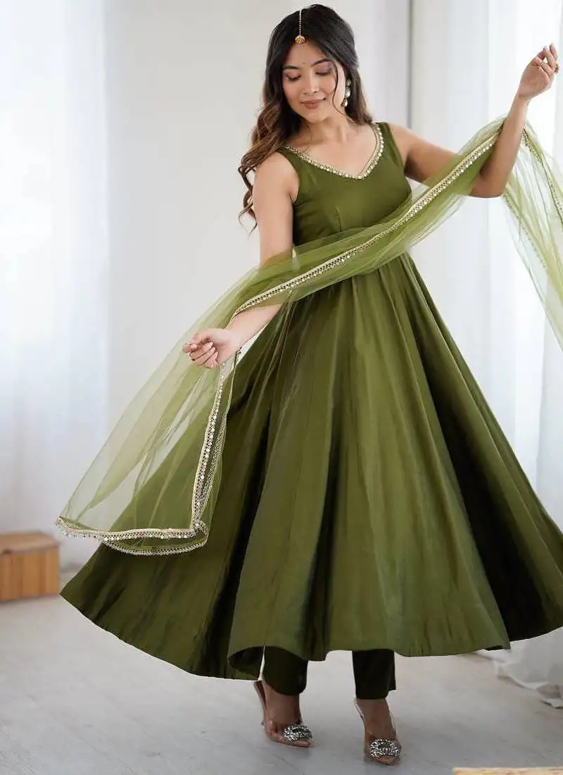 Green color pure roman silk mirror lace party wear gown stitched