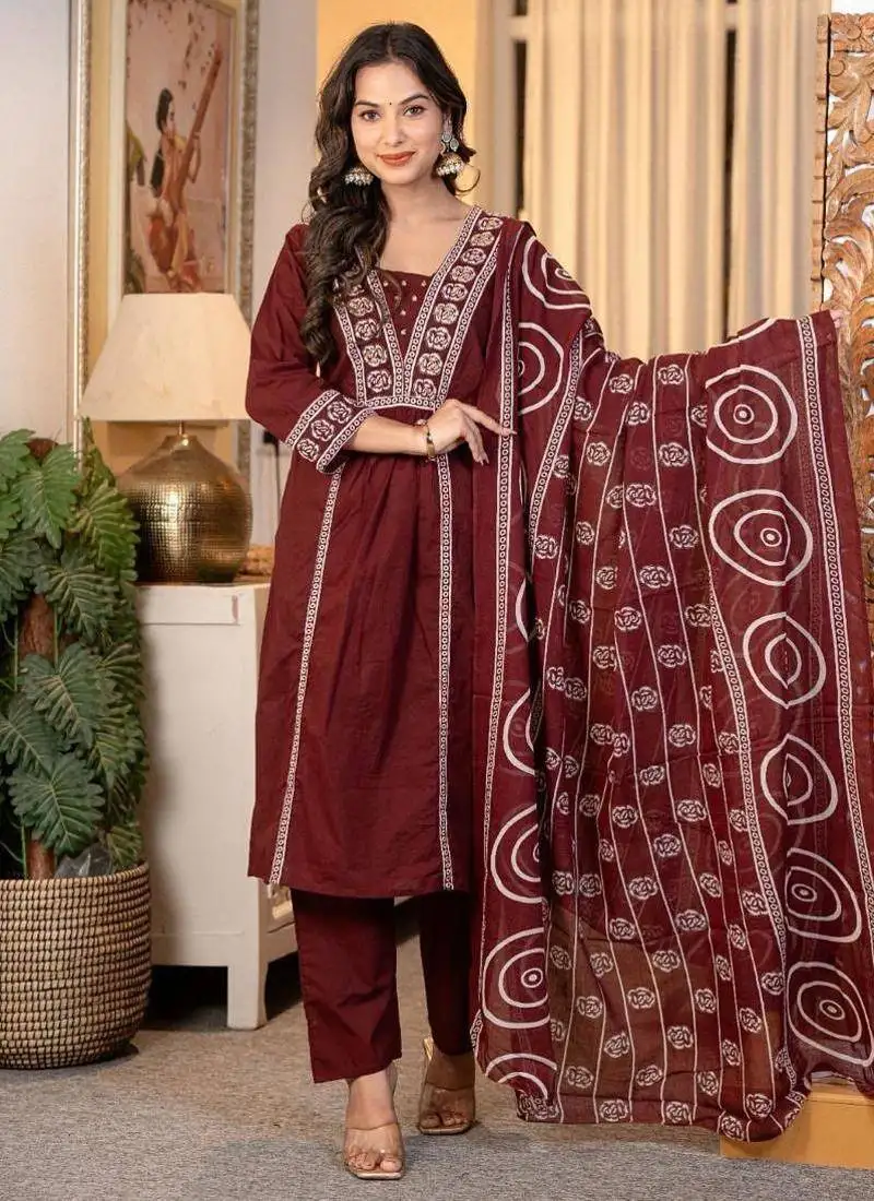 women embroidered red kurta set with printed dupatta