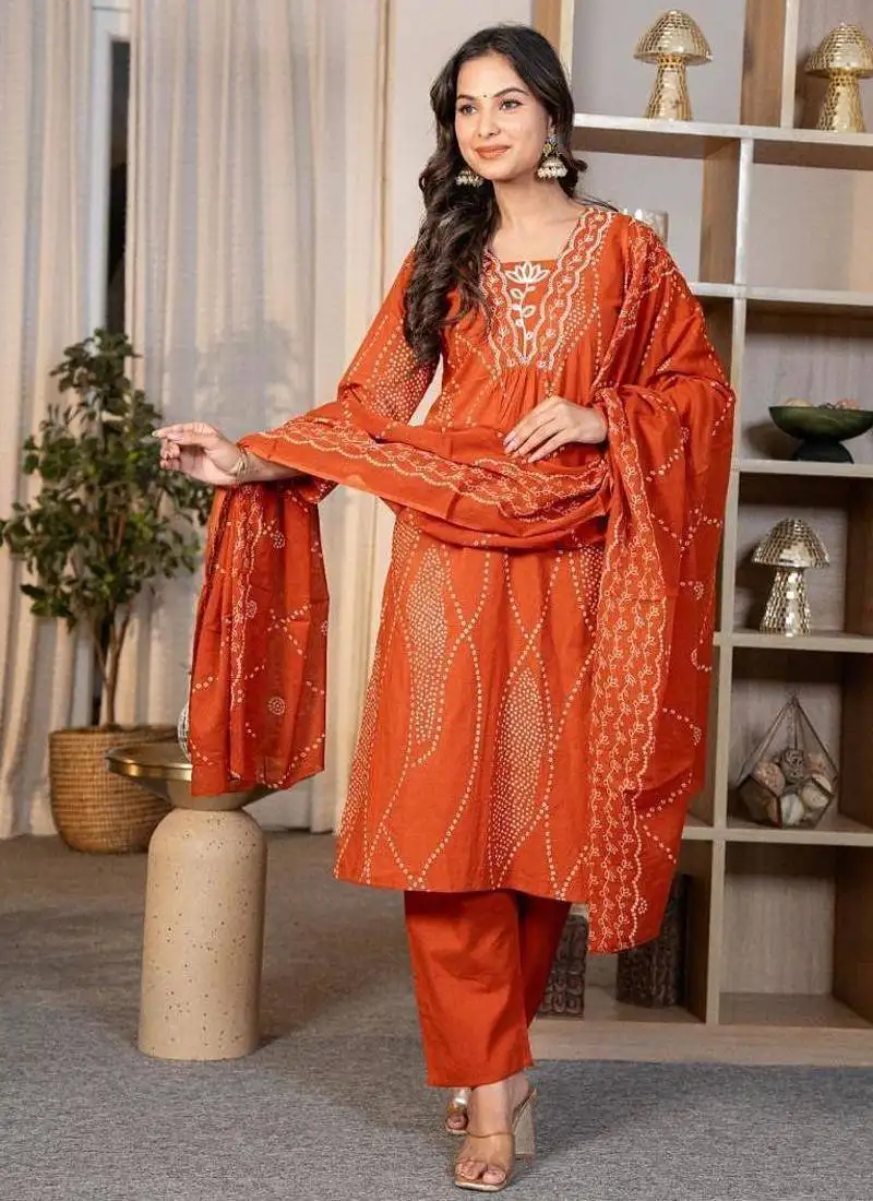 women embroidered orange kurta set with printed dupatta