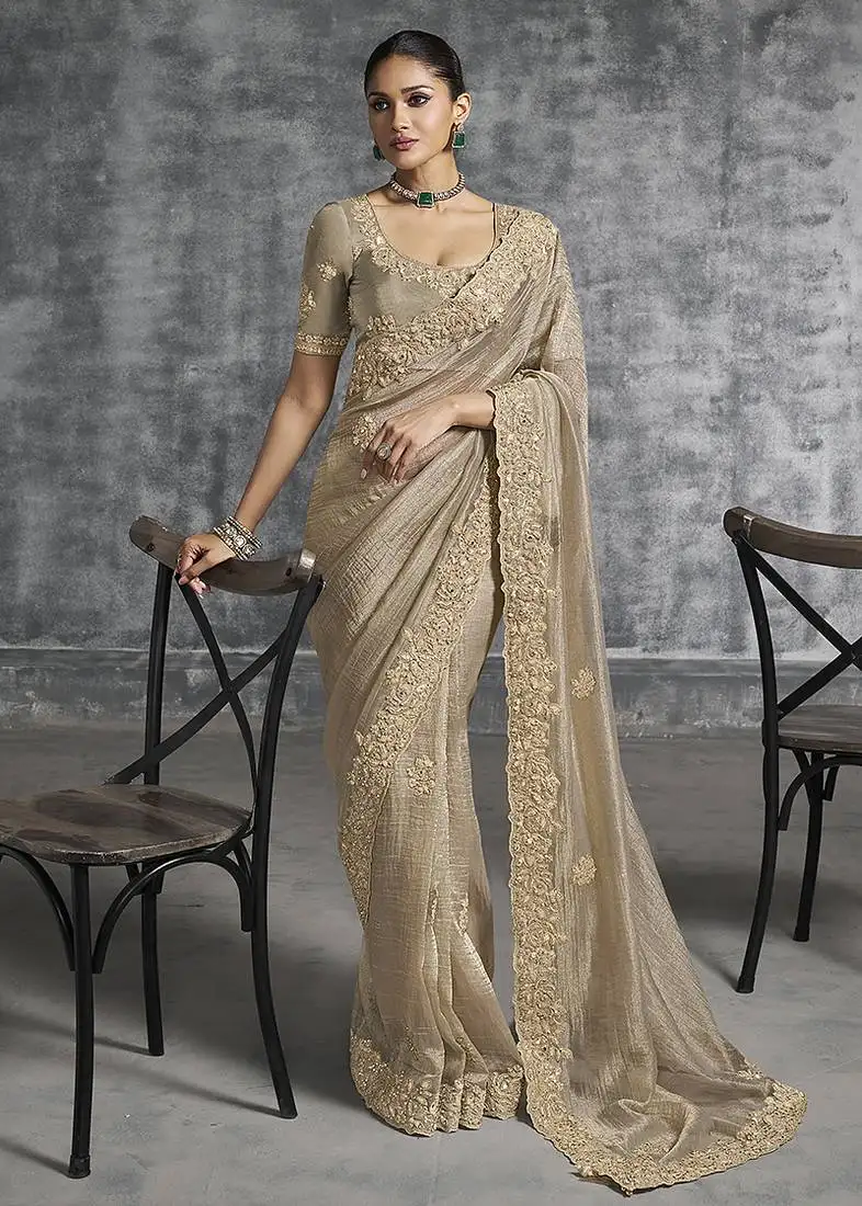 Beige tissue traditional saree with embroidered, resham and thread work for ceremonial
