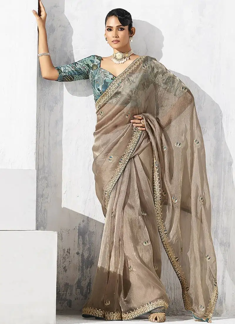 Beige fancy fabric embroidered contemporary saree
