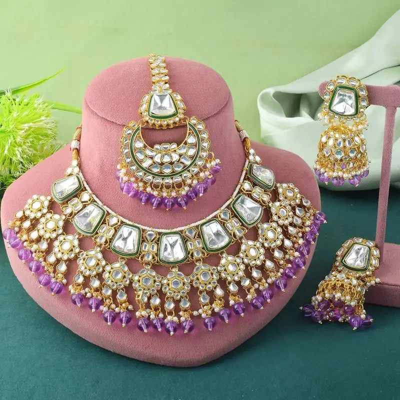 Royal purple color kundan necklace set with gold and gem detailing