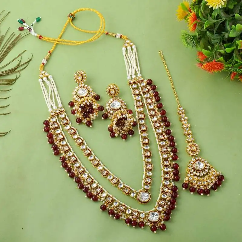 Deep maroon color kundan necklace set with wedding stone highlights