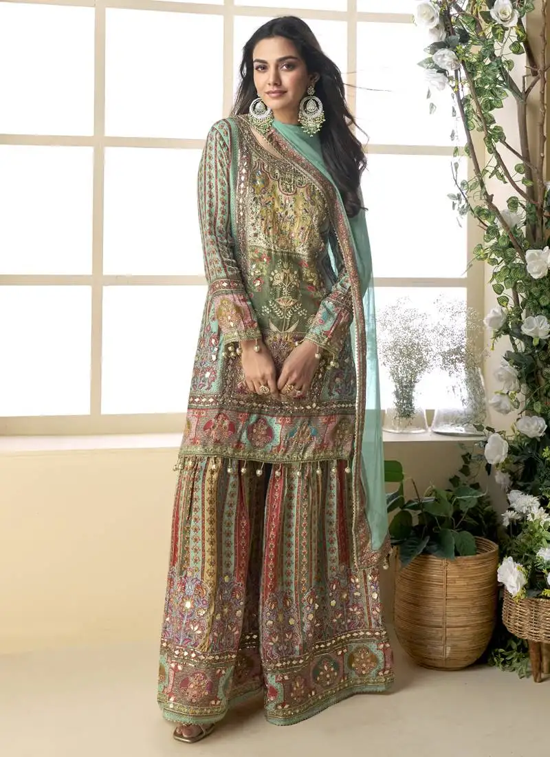 See green crepe silk digital with aari work palazzo suit stitched