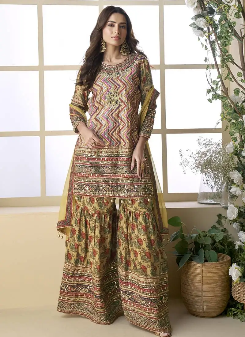 Beige crepe silk digital with aari work palazzo suit stitched