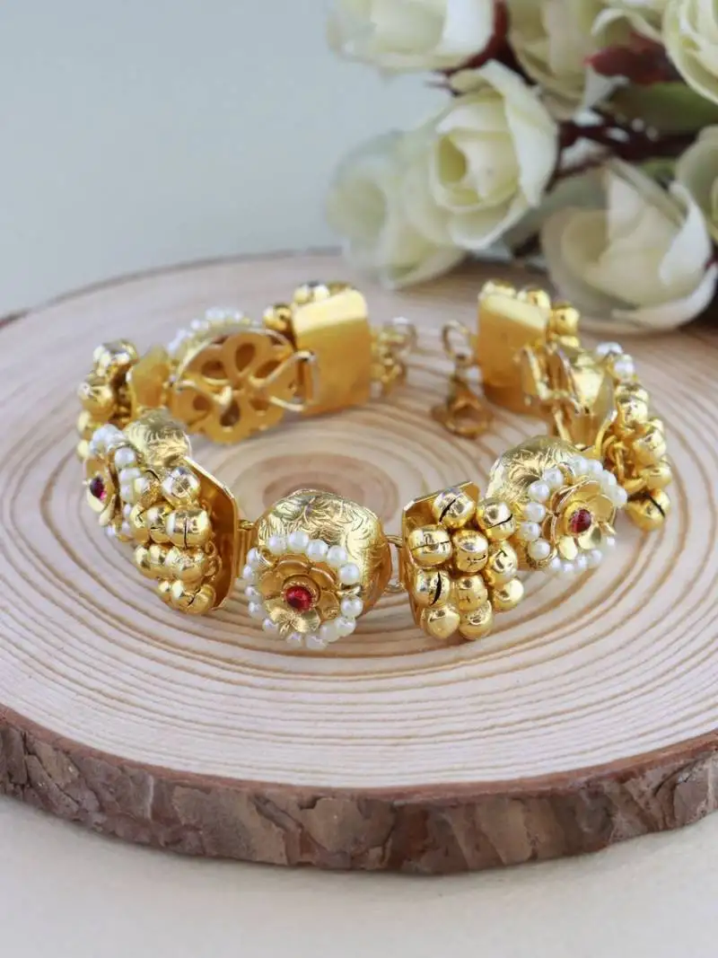 18k gold plated ethnic adjustable white pearl & ghungroo bracelet for women & girls (adb173fl)