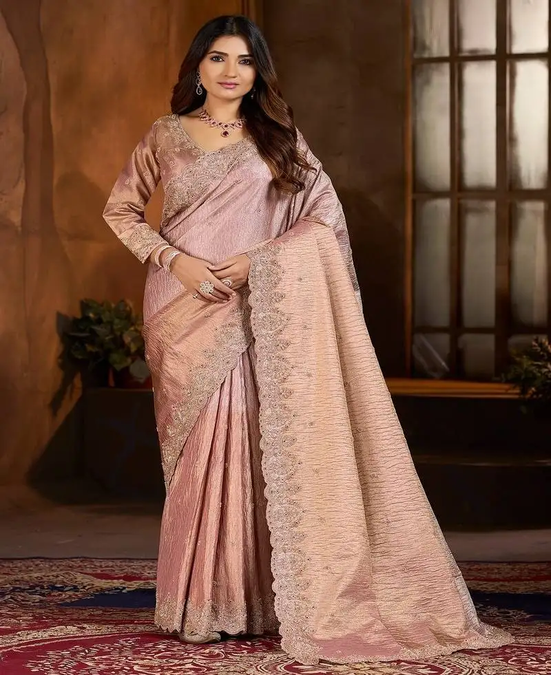 Pink embroidered tissue saree