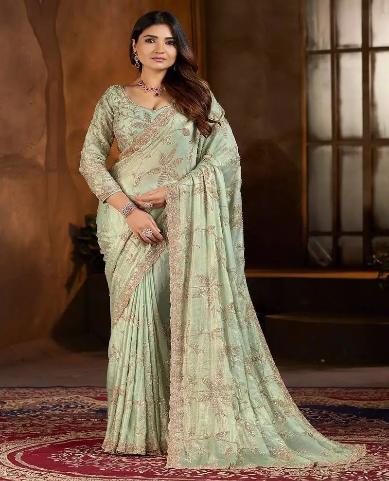 Green embroidered georgette saree