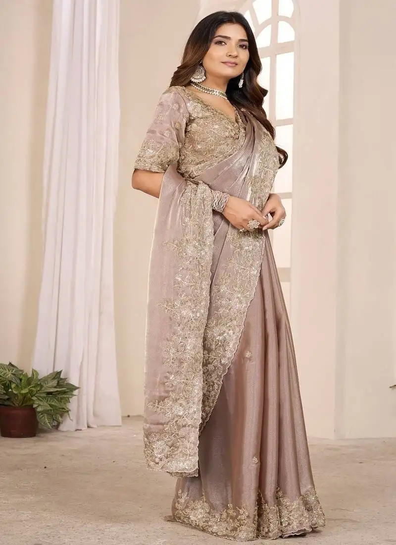 Chiku embroidered georgette saree