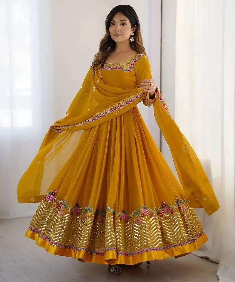 Yellow color heavy georgette wedding wear embroidery work long gown stitched