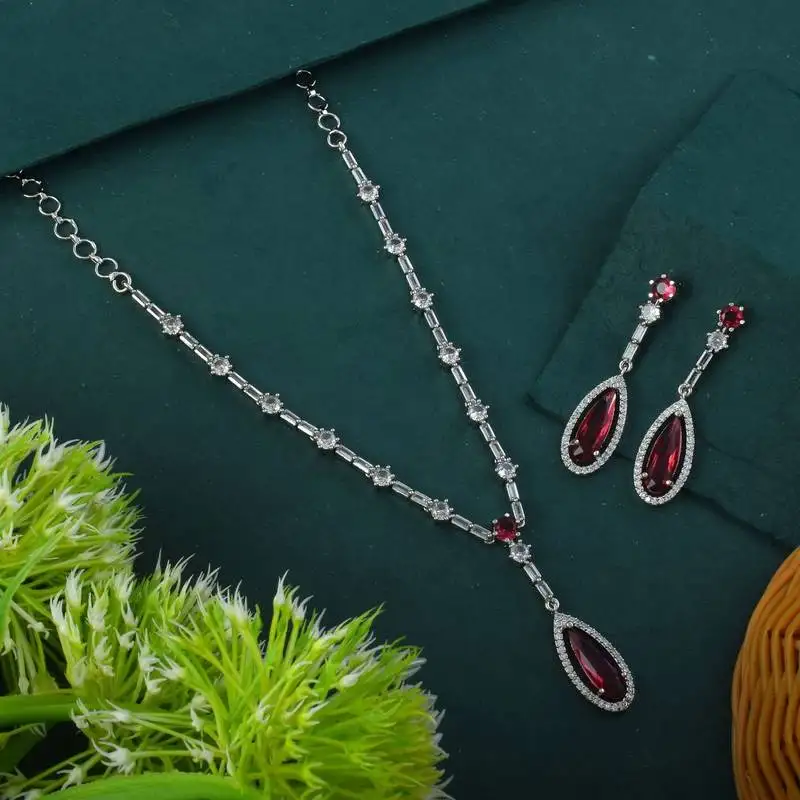 Ruby color american diamond necklace set with floral cluster arrangement