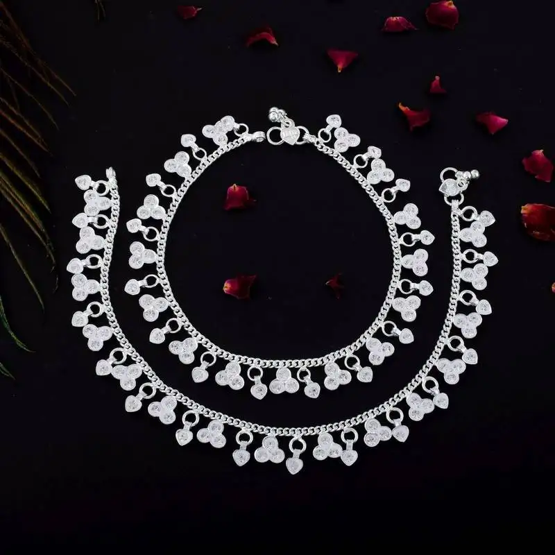 Beautiful silver color anklets crafted with intricate artistic detailing for wedding functions