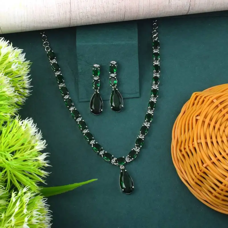 Green color american diamond necklace set with elegant floral design